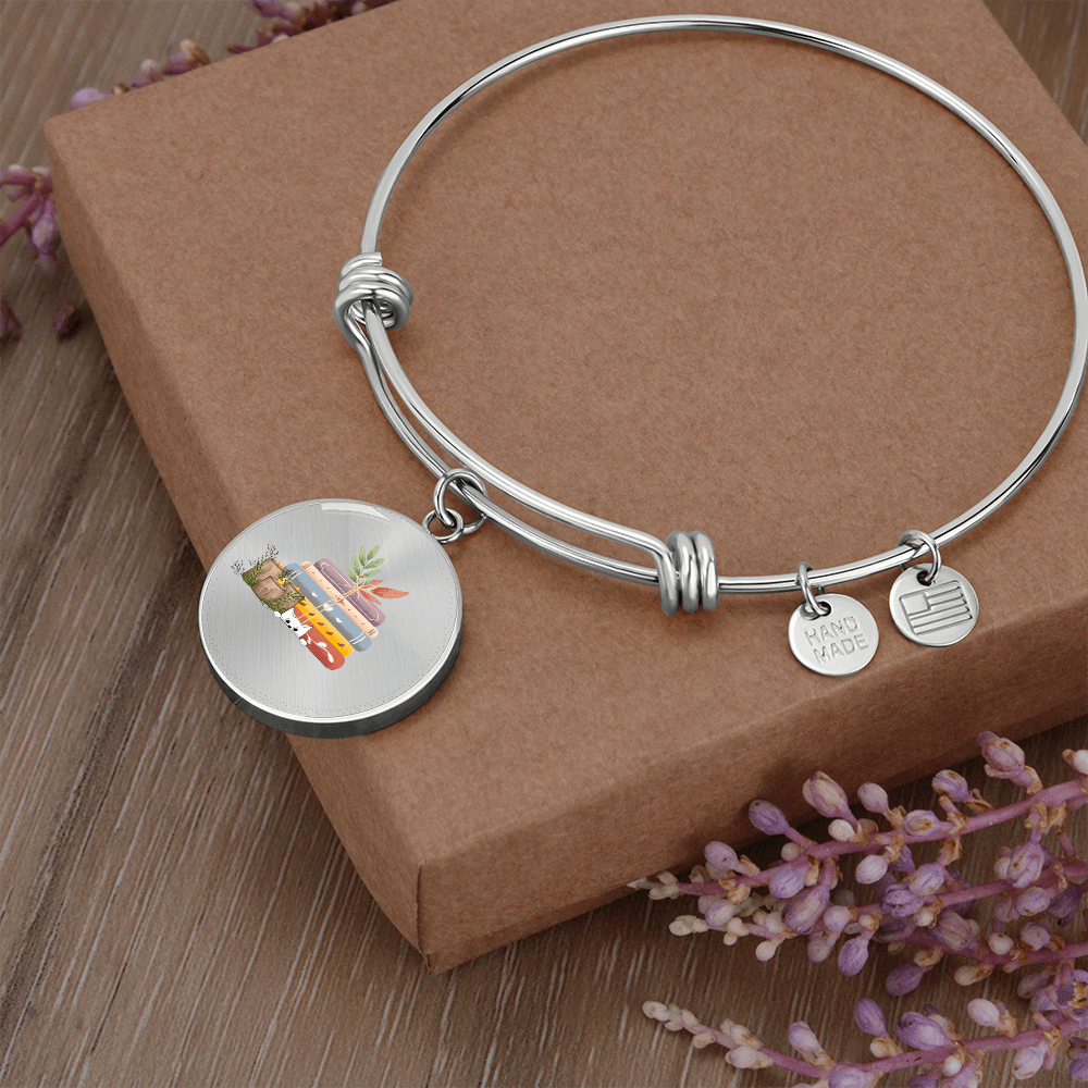 Bracelet avec breloques "livres et bougies" - Les Objets du Chapitre - SO - 14897899 - Bracelet avec breloques "livres et bougies" (argent) - 